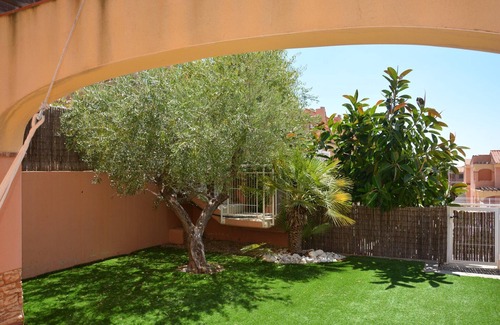 Miami Platja House | Townhouse with private garden and communal pool in Casalot, Miami Playa