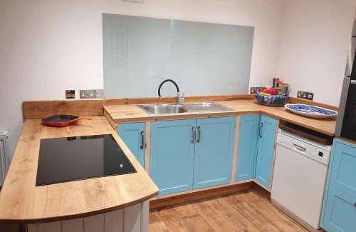 East Coker House | Traditional coach house in rural private estate.