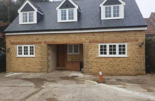 East Coker House | Traditional coach house in rural private estate.