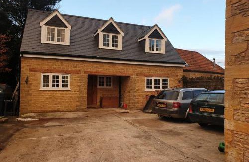 East Coker House | Traditional coach house in rural private estate.