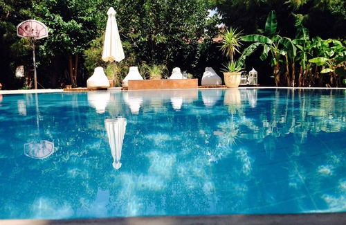 Kayakoy Cottage | Traditional stone cottage with stunning garden in historic Kaya village.