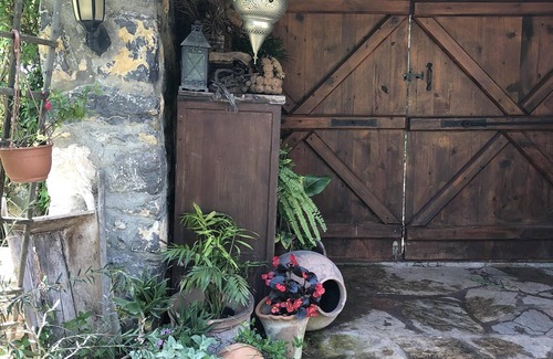 Kayakoy Cottage | Traditional stone cottage with stunning garden in historic Kaya village.