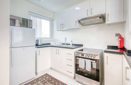 Dubai Ski Chalet | Tranquil 3BR Townhouse at Albizia Damac Hills 2 by Deluxe Holiday Homes