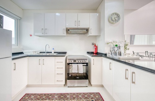 Dubai Ski Chalet | Tranquil 3BR Townhouse at Albizia Damac Hills 2 by Deluxe Holiday Homes