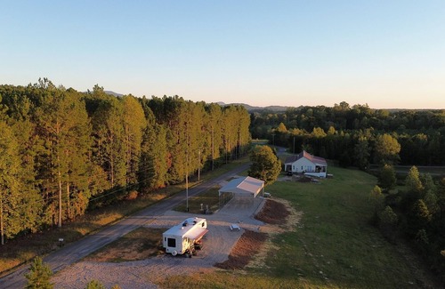 Tennga RV Rental | Tranquil campsite for a peaceful getaway - RV not included
