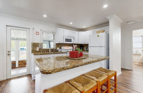 Breezeswept Beach Estates House | Tranquil Florida home with waterfront views, pool table & Wifi