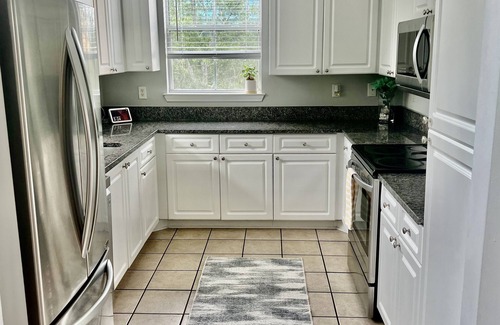 North Brookhaven Condo | Tranquil Penthouse Haven: Your Private Getaway