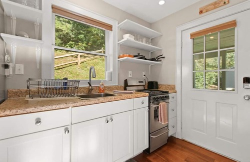 West Jefferson Cabin | Tranquil Riverfront Living at Sasquatch Cabin!