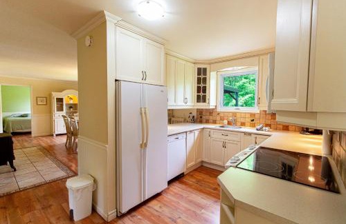 Saint-Raymond Ski Chalet | Tranquil Riverfront Chalet with Hot Tub