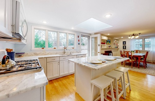 East Orleans House | Tranquil & sunlit home with peaceful yard, large deck, & fireplace - near beach