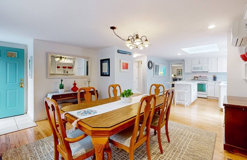 East Orleans House | Tranquil & sunlit home with peaceful yard, large deck, & fireplace - near beach