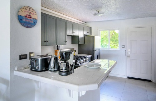Jolly Harbour Villa | Tranquil Waterfront Villa ~ steps from the Beach, with bikes and terrace views