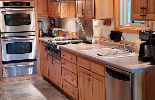Markville Cabin | Tranquil year round retreat on small quiet lake that has WiFi, a HotTub & Sauna