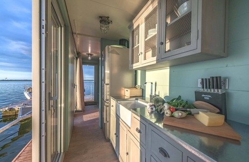 Uecker-Randow Boat Rental | traumHaff houseboat La Péniche/Baltic Sea - design, sunset & sauna on board