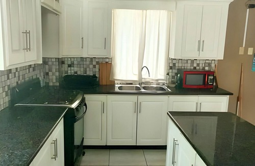 Bon Accord Village House | Travelers Nest- Modern 2-bedroom Townhouse
