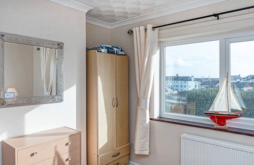 Trearddur Bay House | Trearddur Bay Home with a View, Beach & Snowdon Mountain Range and Hot Tub