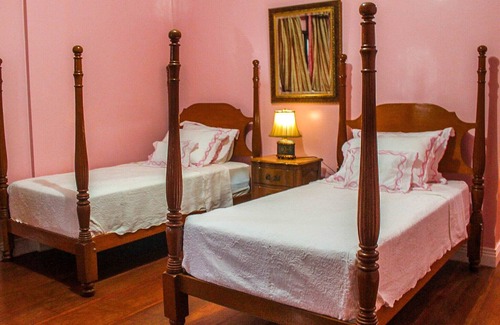 Malitbog Resort | Treasure Bay Dive Resort is set between a scenic forest view and vast calm sea.