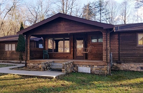 Lost River Cottage | Tree swing, Outdoor dining with Stream and Fire Pit, Large Yard, Sunroom, Trail