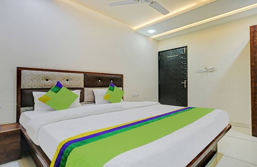 Indore House | Treebo Jayshree Palace C21 Business Park