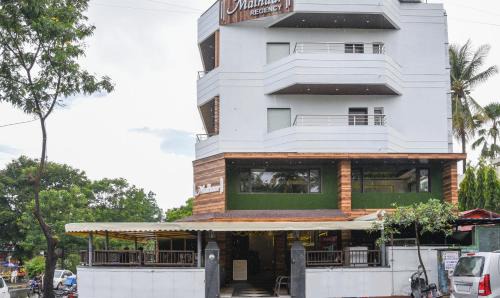 Nigdi Hotel | Treebo Malhaar Regency