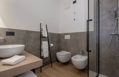 Trento House | Triple room consisting of double bed and single sofa bed