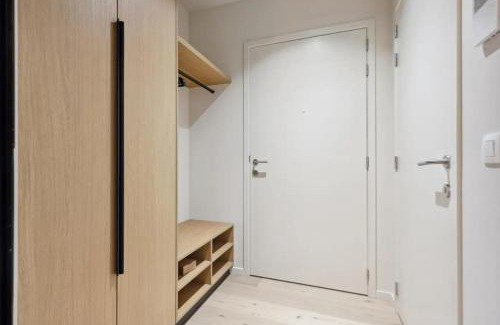 Knokke Apartment | Triton luxe gelijkvloers appartement met tuin en gratis garage