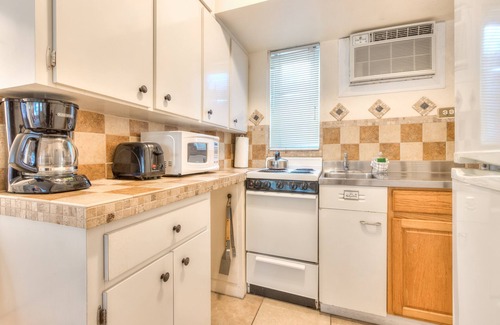 Capri Isle Apartment | Tropic Terrace Suite #16 - Beachfront Resort