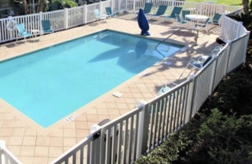 Capri Isle Apartment | Tropic Terrace Suite #16 - Beachfront Resort