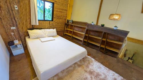 Catangnan Apartment | Tropical Haven with Dedicated Office Space in Siargao