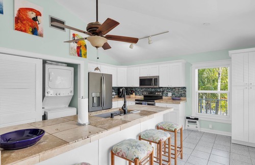 Sugarloaf Key House | Tropical paradise on canal in Lower Keys-pool, tiki, firepit, dock, dog friendly