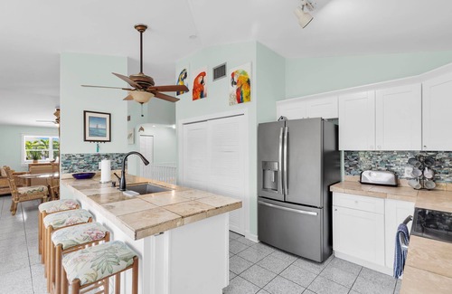 Sugarloaf Key House | Tropical paradise on canal in Lower Keys-pool, tiki, firepit, dock, dog friendly