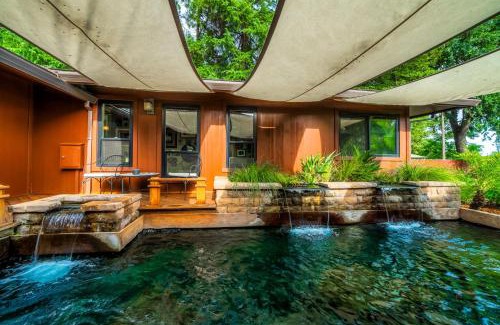 Cascade House | Tropical Riverhouse Retreat