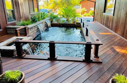 Cascade House | Tropical Riverhouse Retreat