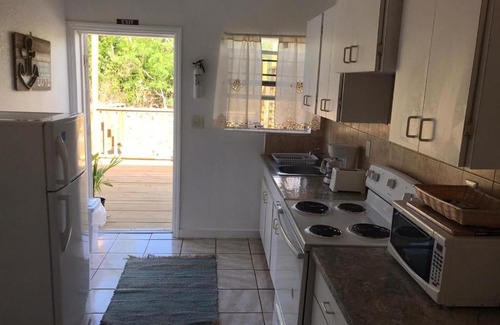 Calvin Hill Apartment | Tropical Treasures Living
