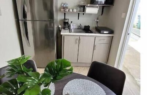 Cuevas Apartment | Trujillo Alto - Quiet and Cozy: Fully Equipped and Pet-Friendly