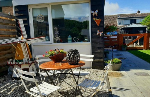 Callantsoog Bed & Breakfast | Tuinhuis Duinroos Deluxe