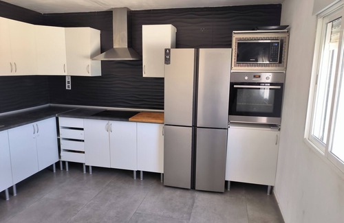 Benicarlo Ski Chalet | Turisblo villa with pool, 3 large bedrooms, large dining room, kitchen and bathroom.