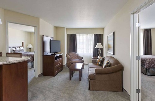 Acres Green House | Two 2BR Pet Friendly Suites Near Denver Art Museum w/ Kitchens! Outdoor Pool!
