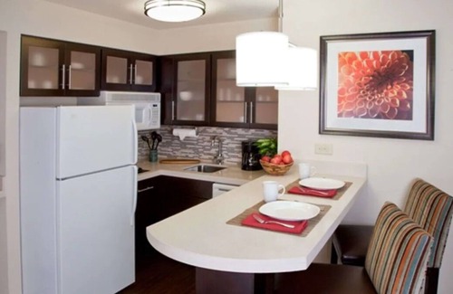 Acres Green House | Two 2BR Pet Friendly Suites Near Denver Art Museum w/ Kitchens! Outdoor Pool!
