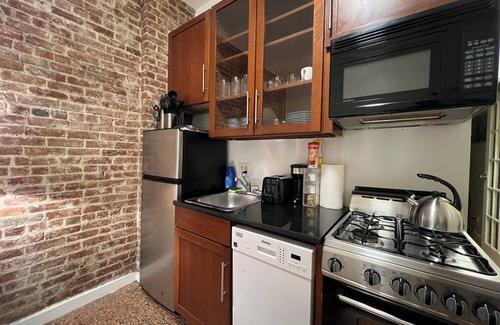Central Park South Apartment | Two Bedroom with Private Backyard