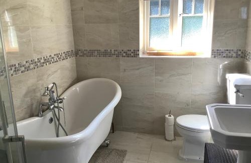 Colwyn Bay House | Two Bedrooms, One Super King Room & One Double Room, plus Sofa Beds & Cot with Private Bathroom for up to 2 Adults & 5 Children & 1 Infant