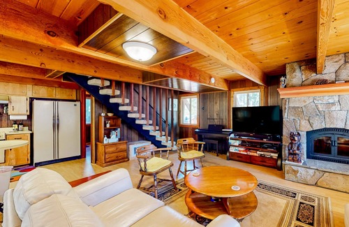 Comstock Acres Cabin | Two-story dog-friendly cabin with a wood fireplace, washer/dryer, & decks