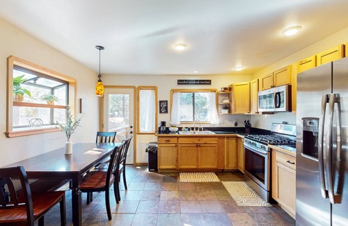 Mountainaire House | Two-story home with sunroom, large yard, fire pit, & BBQ grill