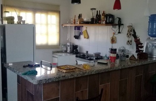 Morro do Algodao House | Two-story house in a gated community
