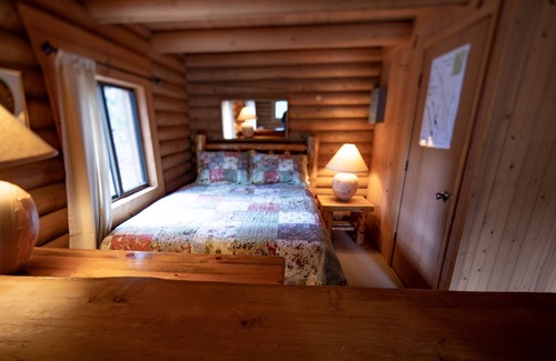 Bigfork Cabin | Two-story woodland cabin with firepit, near Flathead Lake & Glacier