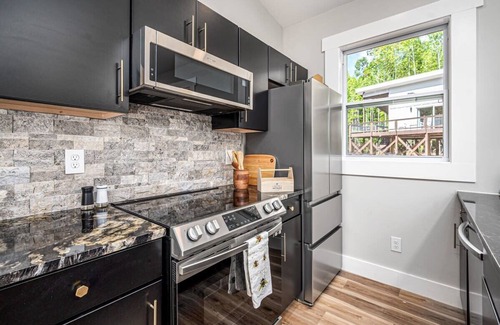 Bynum Apartment | Two Tree Houses - Beehive & H20