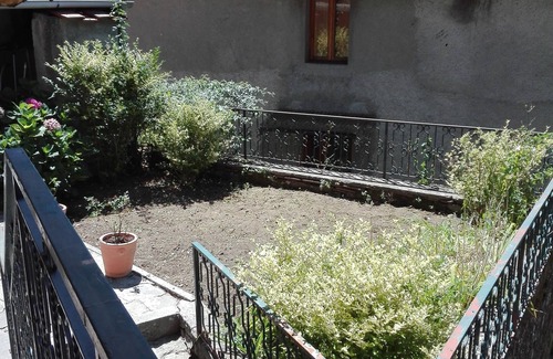 Benabbio Apartment | Typical house with garden and veranda in ancient village