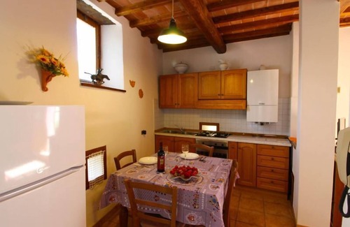 Pieve di Chio Apartment | Typical stone farmhouse ideal for 2 couples with private pool and garden. Perfect for your holidays