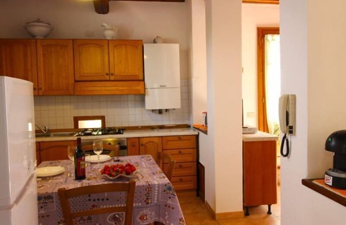 Pieve di Chio Apartment | Typical stone farmhouse ideal for 2 couples with private pool and garden. Perfect for your holidays