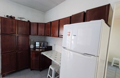 Barra da Lagoa House | Ubatuba beach house with garage spaces, flexible check-in and check-out